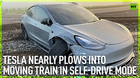 Tesla nearly plows into moving train in self-drive mode