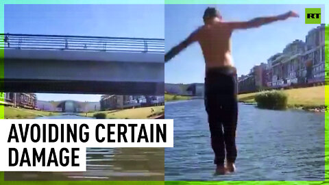 Kid jumps off bridge in Saint-Petersburg not seeing approaching boat