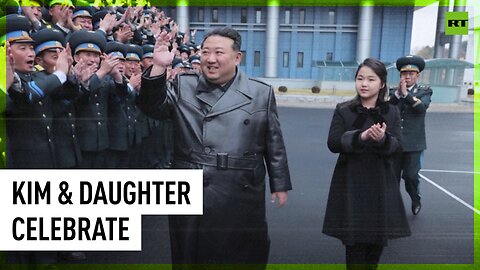 Kim Jong Un celebrates satellite launch with daughter
