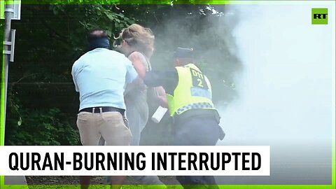 Woman with fire extinguisher interrupts Quran burning in Stockholm