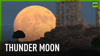 Thunder moon adorns night sky over Temple of Poseidon