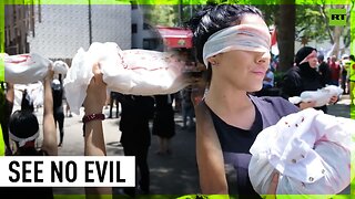 Brazilian activists raise effigies of dead babies at pro-Palestinian rally