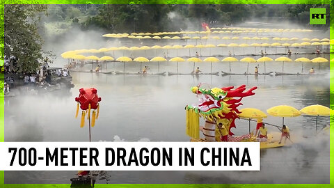 Giant ‘golden dragon’ made of rafts floats down river in China