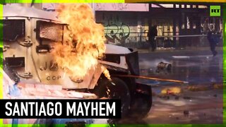 Fire and mayhem descend on Santiago on May Day