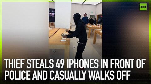 Thief steals 49 iPhones in front of police and casually walks off