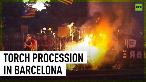Demonstrators light up flares and torches on Catalan independence referendum anniversary