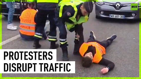 Climate activists block road, causing traffic chaos in Paris