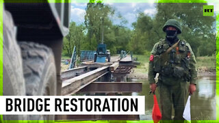 Russian military restores road bridge in Kharkov Region