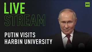 Putin visits Harbin university, holds meeting with students and teachers