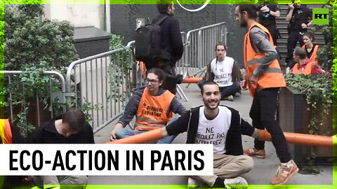 Eco-activists block Macron’s party HQ in Paris