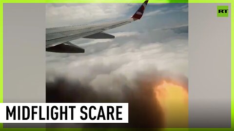 Terrifying moment an airplane engine explodes mid-flight