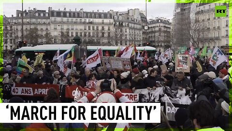 Hundreds rally against immigration law in Paris