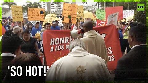 Workers march against new law banning heat protection mandates in Florida