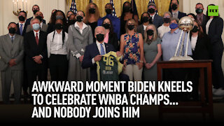 Awkward moment Biden kneels to celebrate with WNBA champs... And nobody joins him
