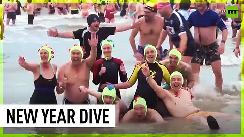 Hardy souls brave chilly waters for New Year’s plunge into North Sea