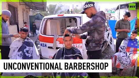 Damaged ambulance turned into barbershop in Gaza