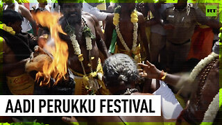 Coconut-smashing ritual honours deity at Aadi Perukku Hindu festival