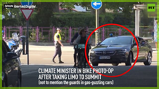 Climate minister in bike photo-op after taking limo to summit