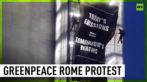 Greenpeace climbers scale ENI building in Rome to protest fossil fuels