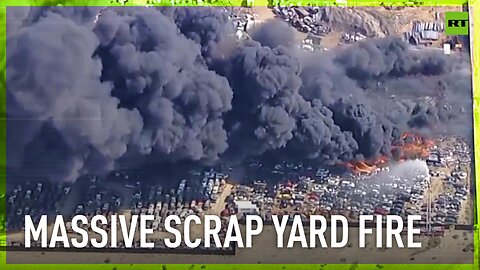 Dozens of cars on fire at scrap yard in California