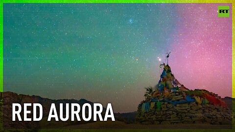 Red aurora and meteor light up Altay's sky