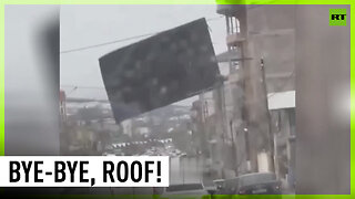 Roof gets torn off the building, smashes parked car in Dagestan