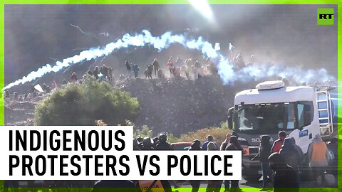 Riot police clash with Indigenous protesters over constitution reform