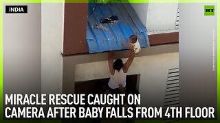 Miracle rescue caught on camera after baby falls from 4th floor
