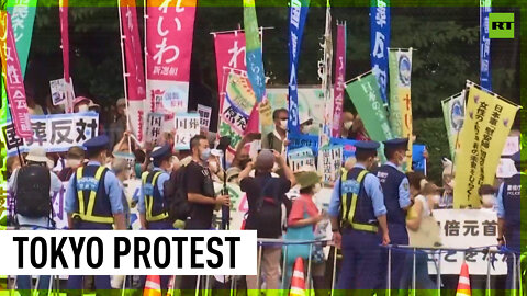 Protesters march against state funeral for slain ex-PM in Japan