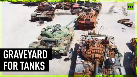 Mariupol car park turned into junkyard for tanks