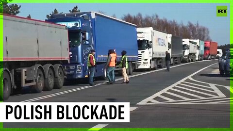 Polish activists block trucks with food & medicine heading to Belarus