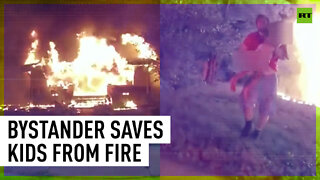Hero bystander saves kids from burning building in miracle rescue