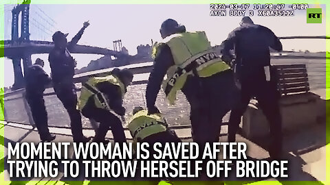 Moment woman is saved after trying to throw herself off bridge