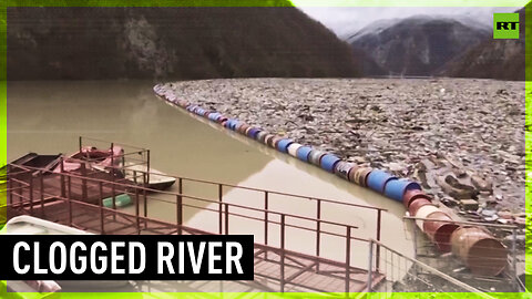 Trash island clogs Bosnia river
