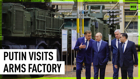 Putin inspects military hardware at weapons factory