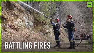 Firefighters battle flames in Greece's Pieria Mountains