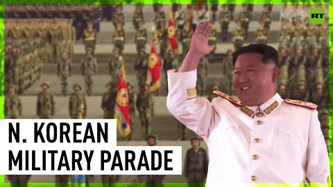 Kim vows to ramp up nuclear program as North Korea holds military parade