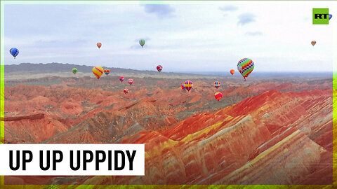 Dozens of hot air balloons color up the skies of China's Gansu Province