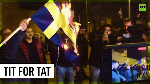 Turkish activists set Swedish flag on fire following Koran burning in Stockholm