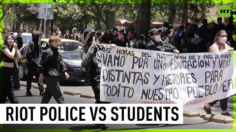 Santiago police use water cannons against student protesters (but students don't mind)