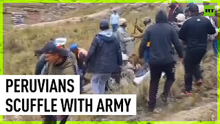 Residents of Peru border town push away army troops