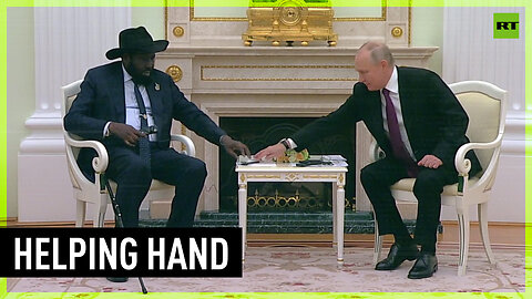 Putin helps South Sudan president with headset