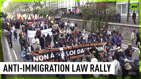 Protesters march (and dance) against controversial immigration bill in Paris