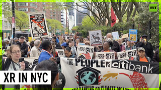 Extinction Rebellion rallies against fossil fuels outside Citibank in NYC