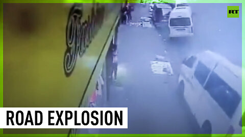 Moment busy road explodes in mystery blast