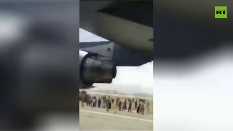 Afghan man clings to C-17A as it takes off in desperate bid to flee his homeland