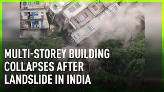 Moment multi-storey building collapses after landslide in India
