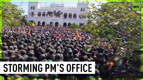 Shots fired as protesters storm PM's Office in Colombo