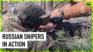 Russian snipers conduct firing mission on the frontline