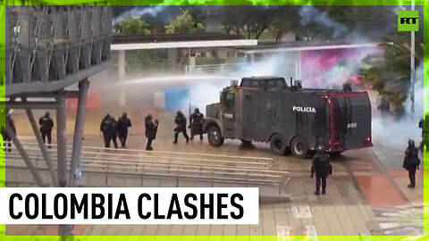Stones, tear gas and water cannons: Protesters clash with cops in Bogota